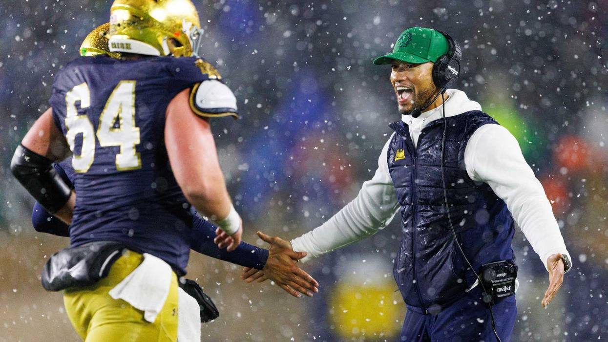 Marcus Freeman celebrates touchdown with offensive lineman