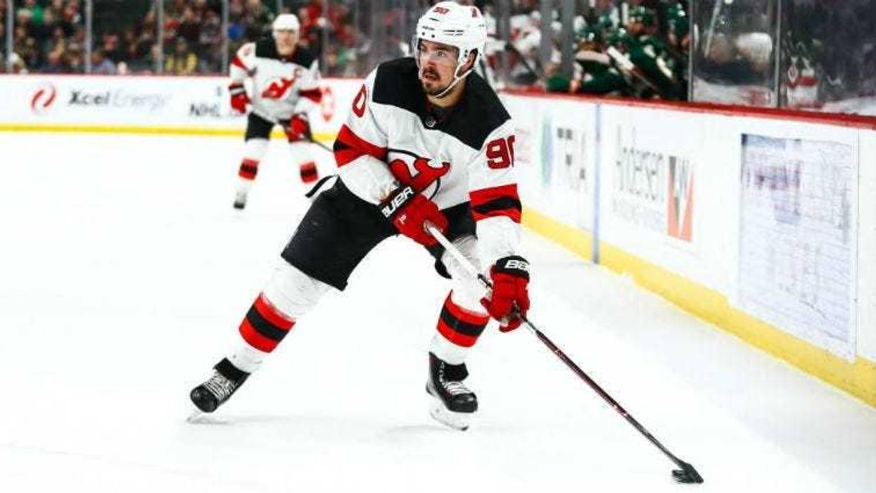 Marcus Johansson skates with the puck in the first period against the Minnesota Wild at Xcel Energy Center.