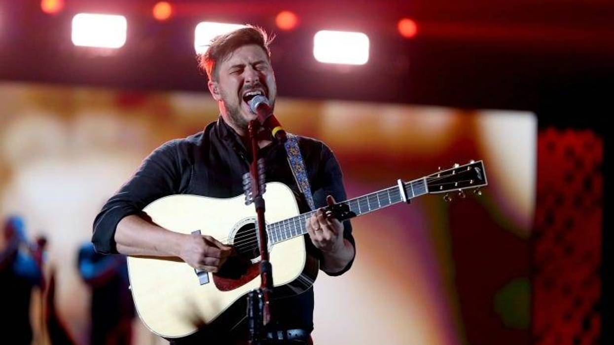 Marcus Mumford of Mumford & Sons performs onstage