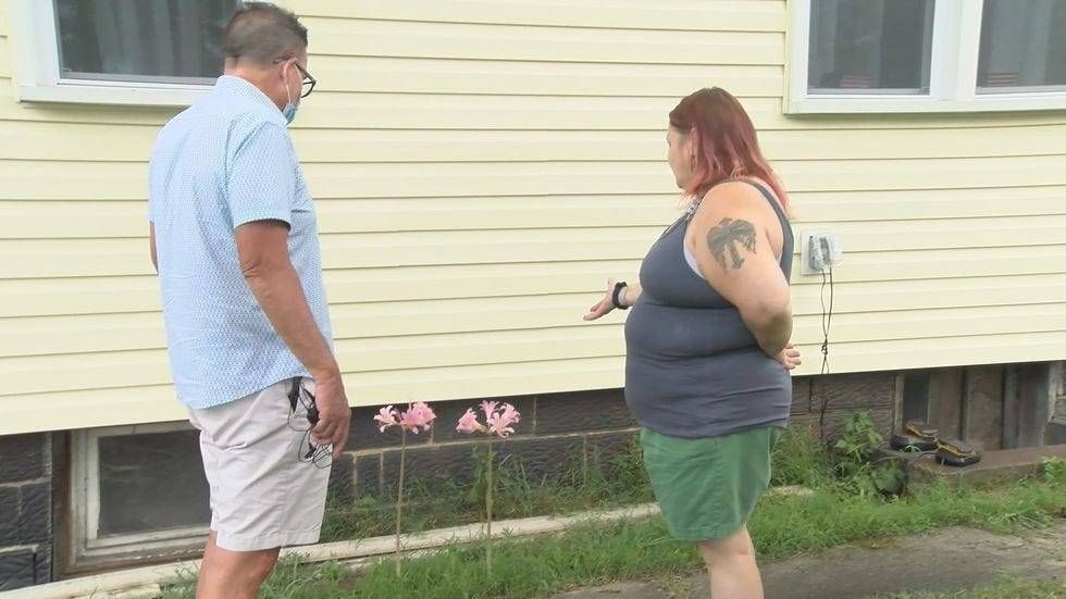 Margaret shows Marty two flowers that bloomed out of nowhere on the side of her home. For her, it