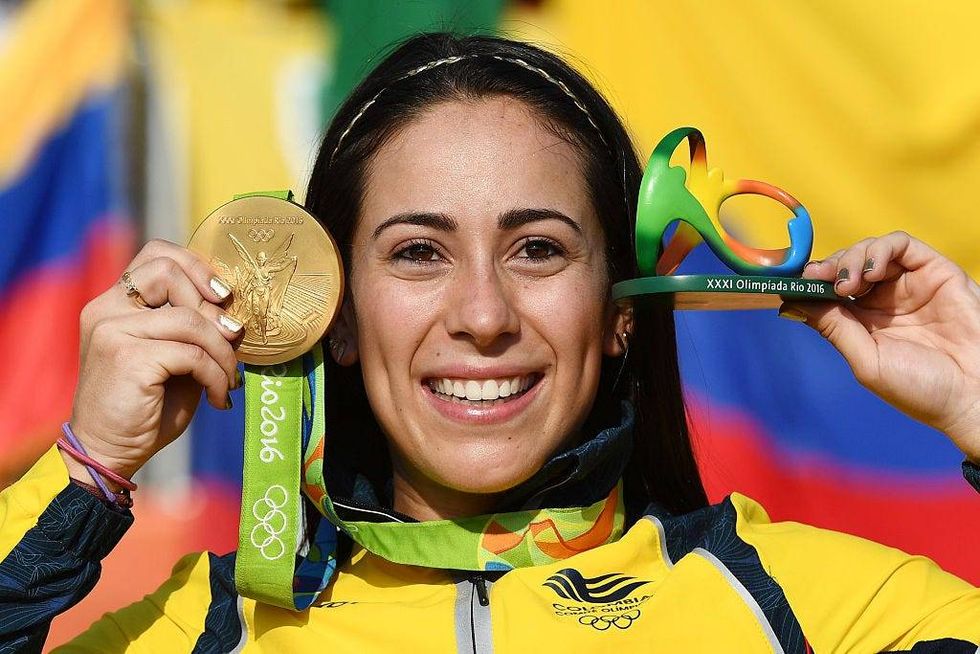 Mariana Pajon of Colombia celebrates with the gold after winning the Women