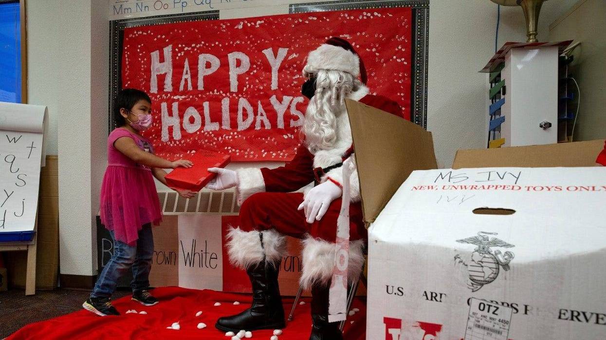 Marines on snowmobiles help Santa in Alaska's remote Arctic