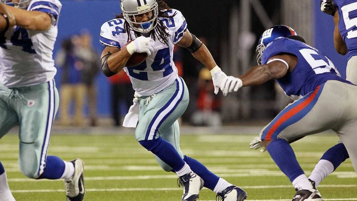 Marion Barber #24 of the Dallas Cowboys runs the ball against the New York Giants on November 14, 2010 at the New Meadowlands Stadium in East Rutherford, New Jersey. The Cowboys defeated the Giants 33-20.