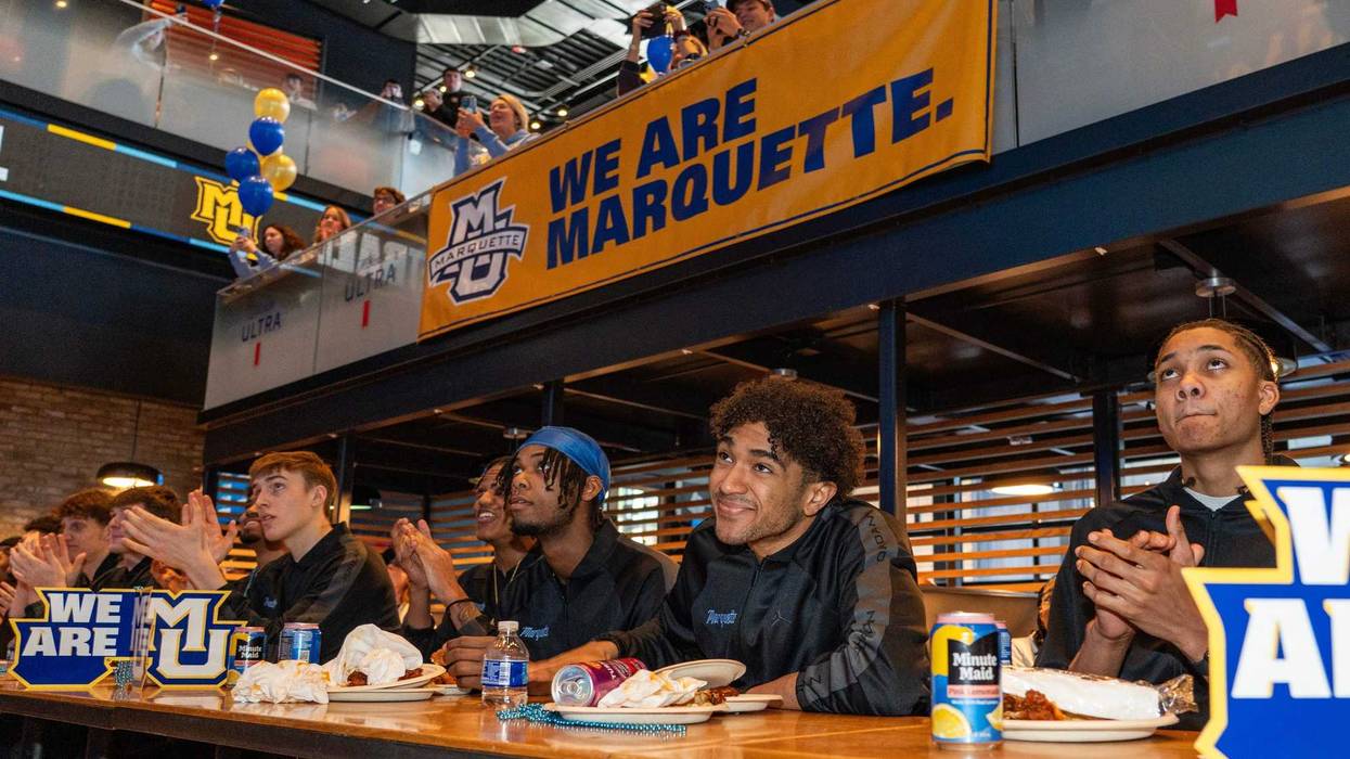 Marquette Golden Eagles players watch the NCAA selection show during the Marquette University men's basketball team NCAA tournament selection show party at MECCA Sports Bar and Grill on Sunday March 16, 2025 in Milwaukee, Wis.