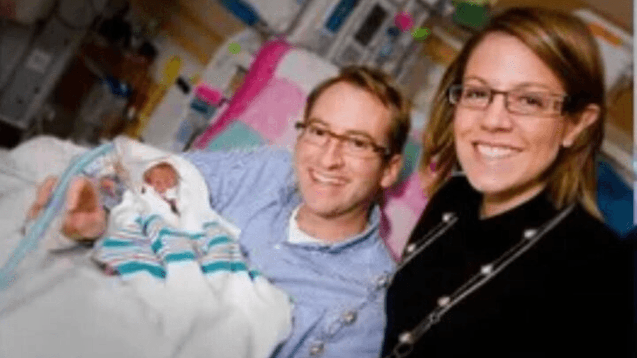 Martha and Paul Sharkey holding their baby, Claire, at Abington Hospital NICU in 2010.