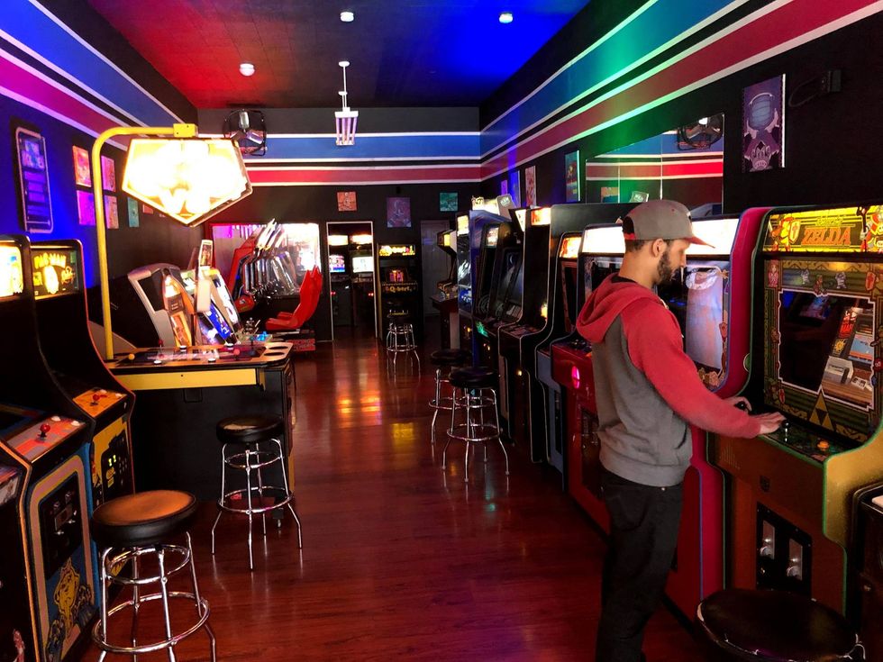 Masks are still required while playing games inside High Scores, at least through the end of summer.