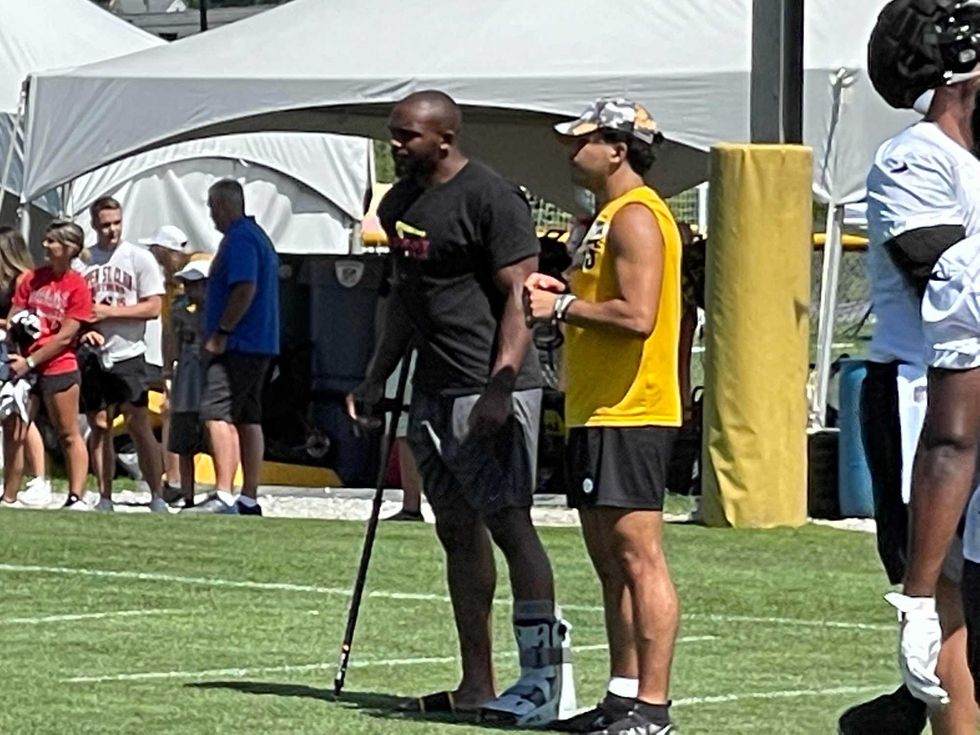 Master Teague with a walking boot