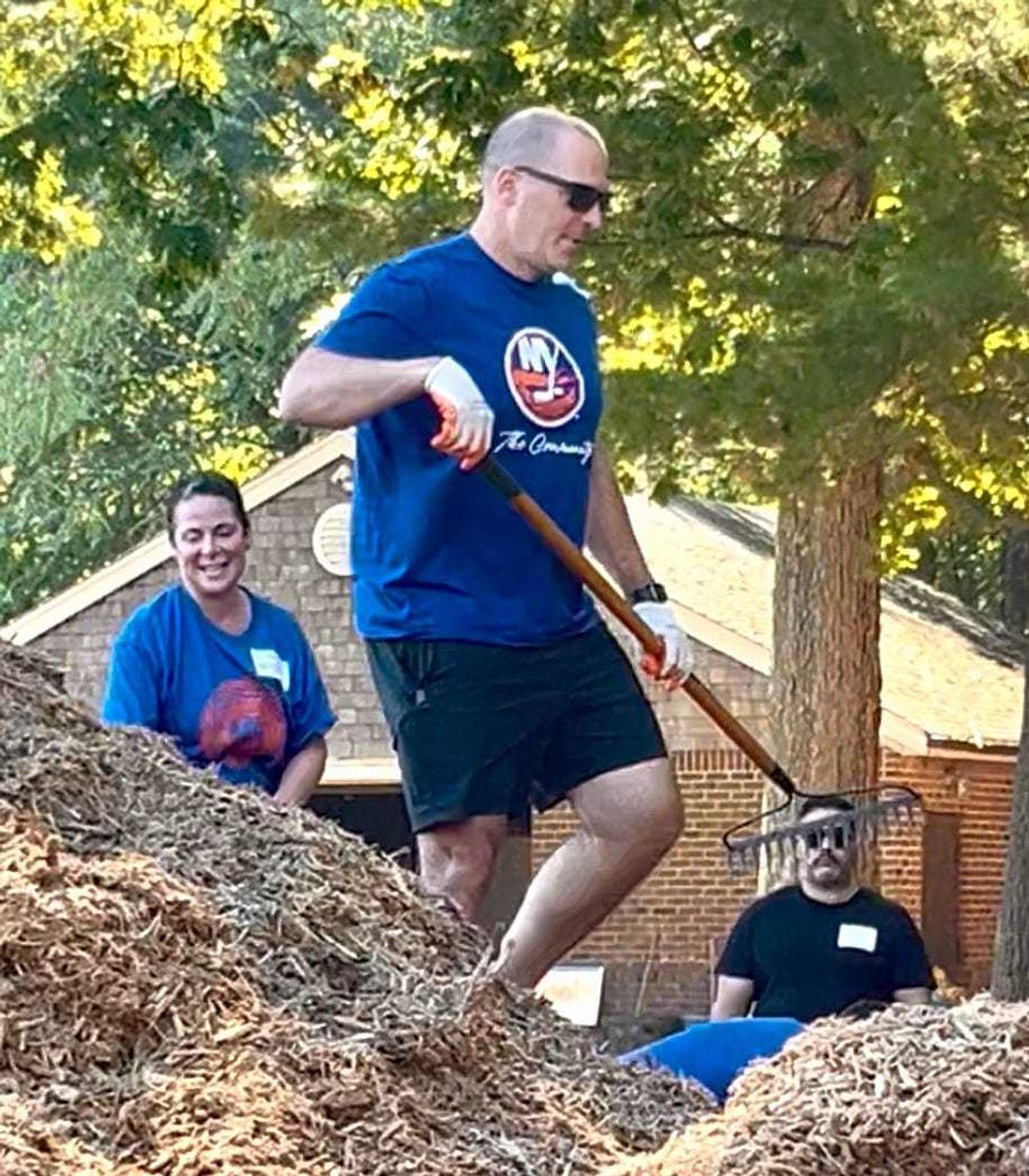 Mathieu Darche tackles a pile of mulch