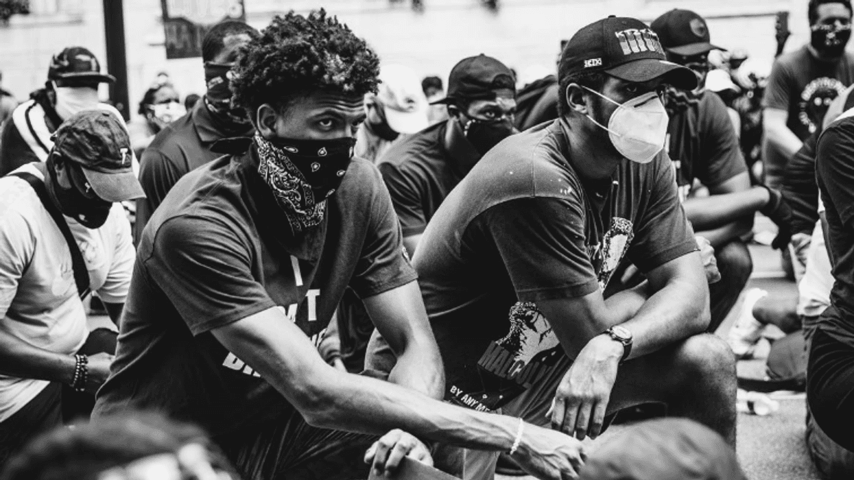Matisse Thybulle and Tobias Harris of the 76ers protesting in Philadelphia.