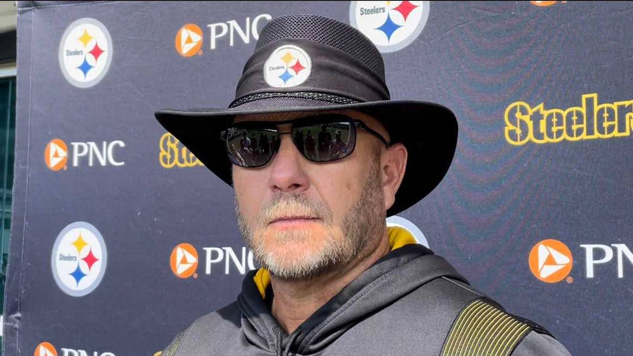 Matt Canada at podium