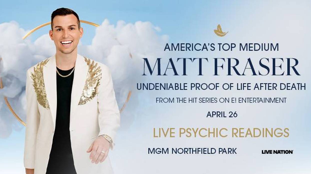 Matt Fraser, America's Top Medium, in a white suit with gold wings, for live psychic readings.