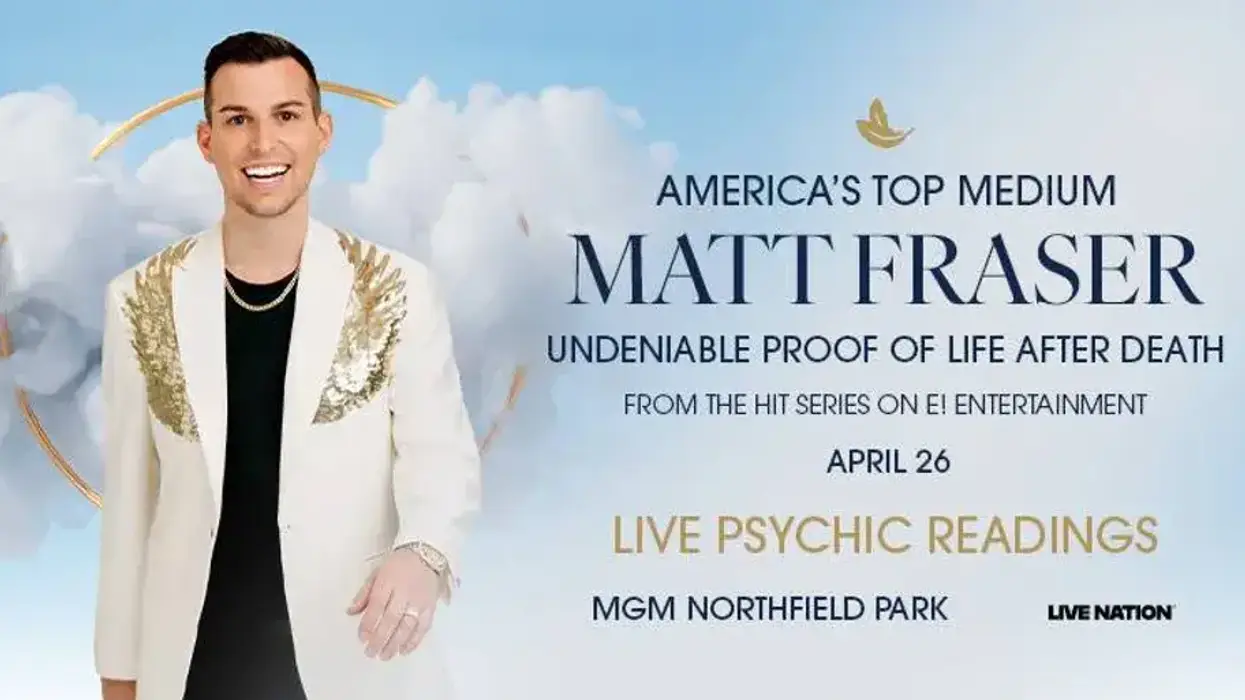 Matt Fraser, America's Top Medium, smiling in a suit, promotes live psychic readings.