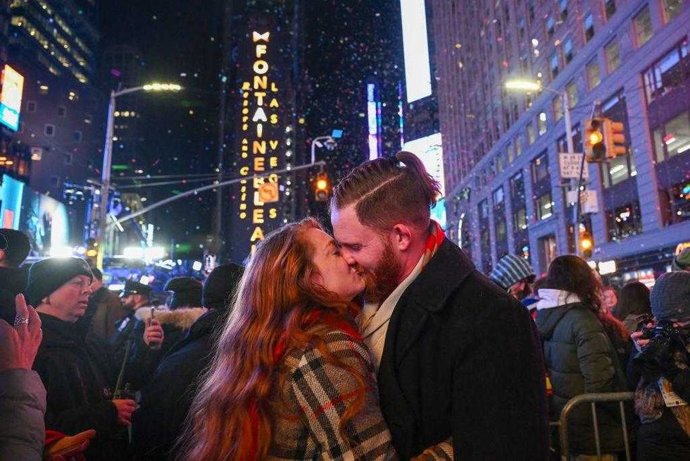 Matt Lutz and Olivia Shain, from Owensville, Indiana, get engaged at midnight on New Year