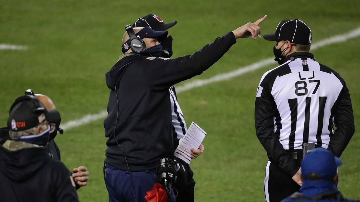Matt Nagy of the Chicago Bears discusses a play with game officials in the game against the Minnesota Vikings at Soldier Field on November 16, 2020 in Chicago, Illinois.