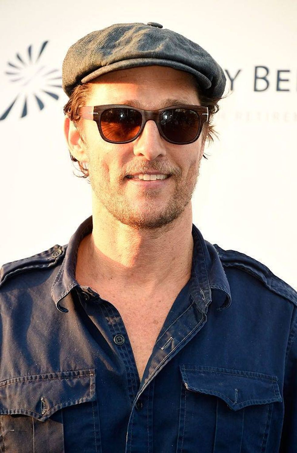 Matthew McConaughey wearing wayfarer-style sunglasses