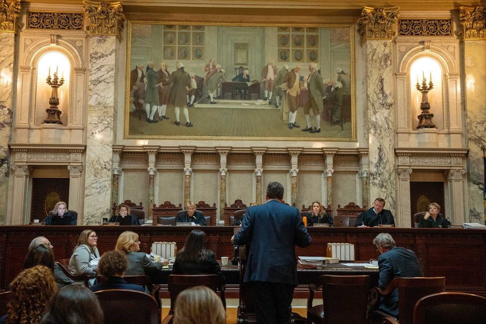 Matthew Thome, representing Sheboygan County, stands before the state Supreme Court during oral arguments about an 1849 law outlawing abortion Monday, Nov. 10, 2024, at the Capitol in Madison, Wisconsin.