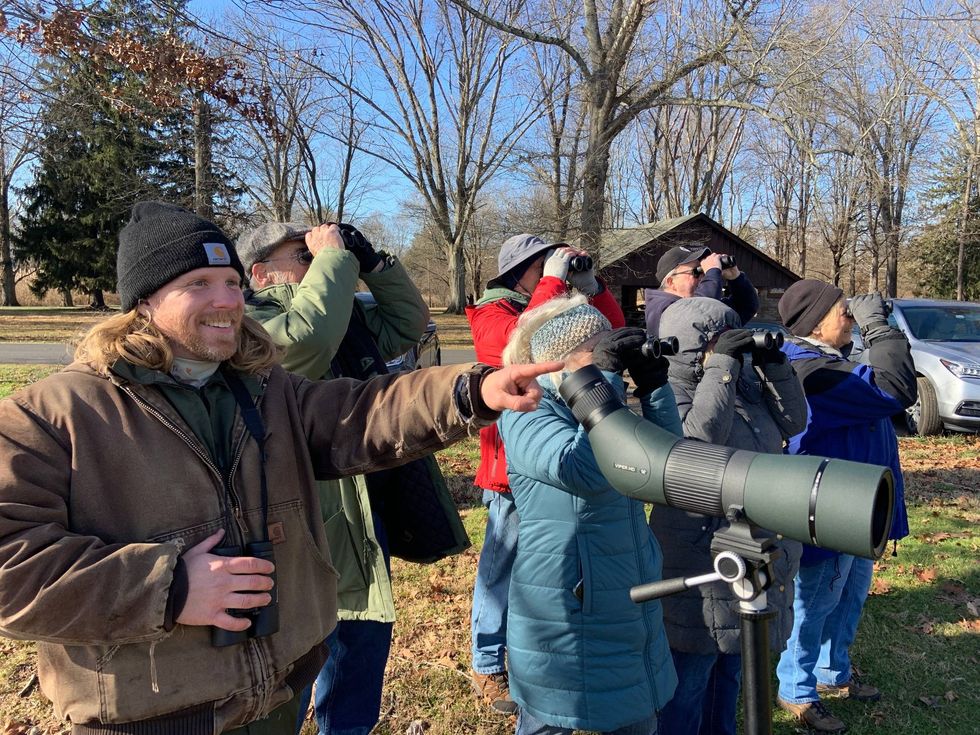 Matthew Truesdale (left) is an environmental education specialist with the Pennsylvania Department of Conservation of Natural Resources. He took birdwatchers as part of the Audobon Society