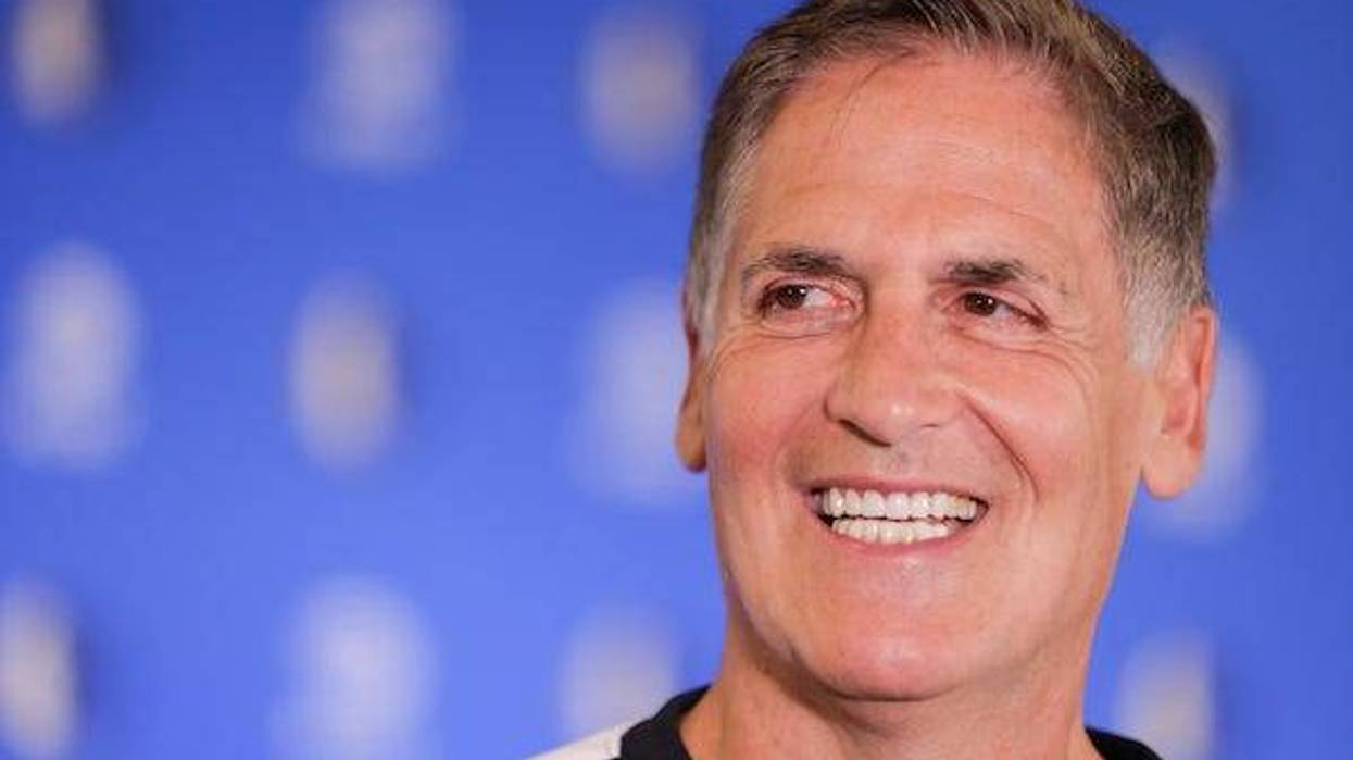 Mavericks owner Mark Cuban smiles during a press conference