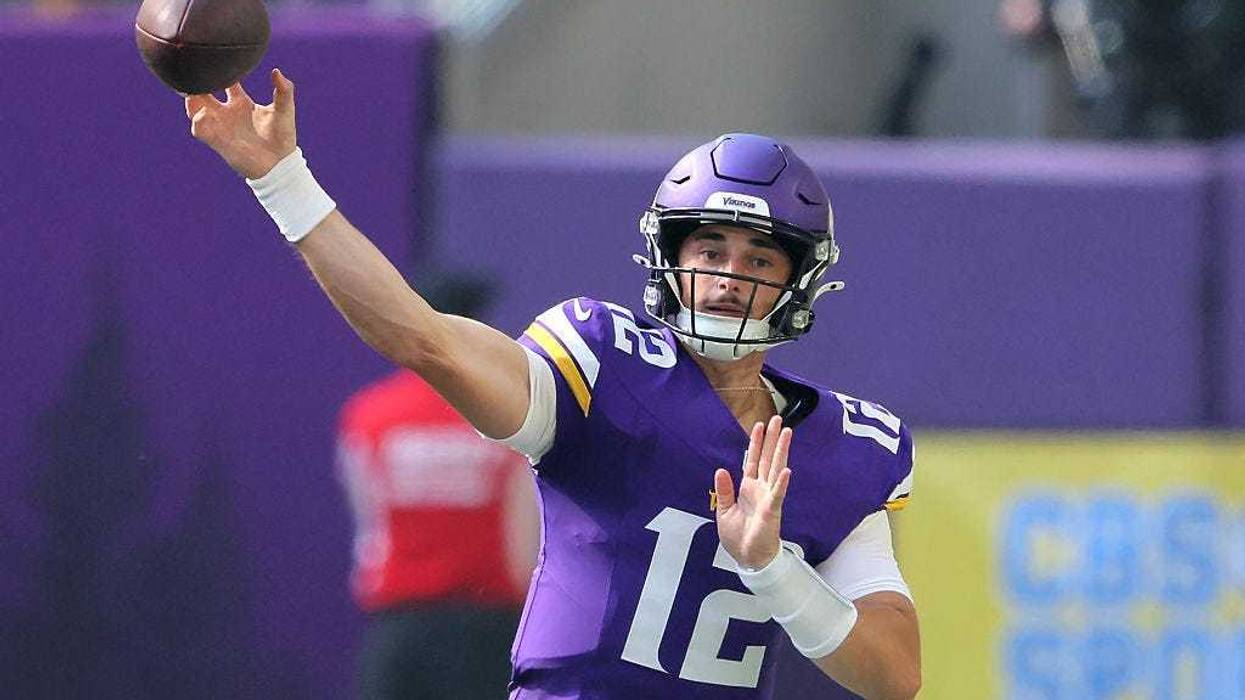 Max Brosmer #12 of the Minnesota Vikings throws the ball against the Cincinnati Bengals at U.S. Bank Stadium on September 21, 2025 in Minneapolis, Minnesota.