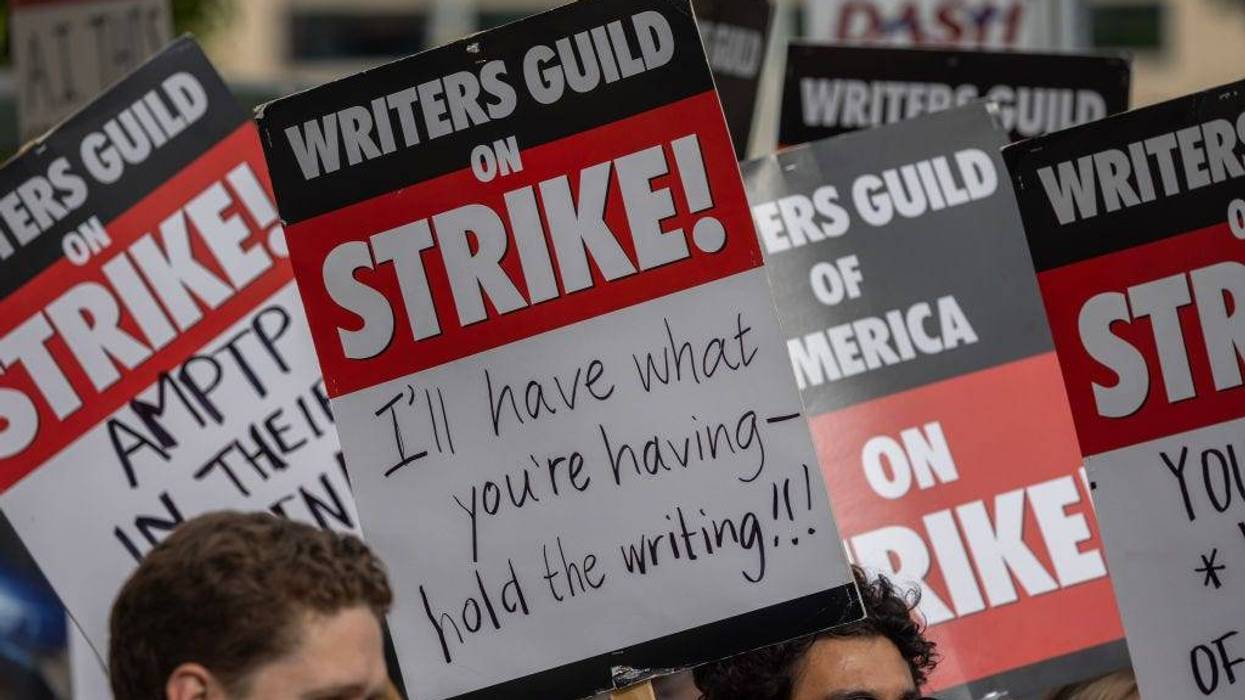 MAY 04: People picket outside of Paramount Pictures studios during the Hollywood writers strike on May 4, 2023 in Los Angeles, California.
