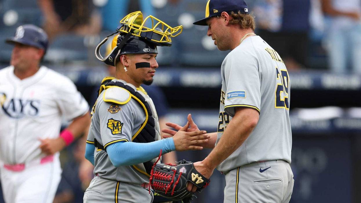 May 11, 2025; Tampa, Florida, USA; Milwaukee Brewers pitcher Trevor Megill (29) and catcher William Contreras (24) celebrate after beating the Tampa Bay Rays at George M. Steinbrenner Field. Mandatory Credit: Nathan Ray Seebeck-Imagn Images