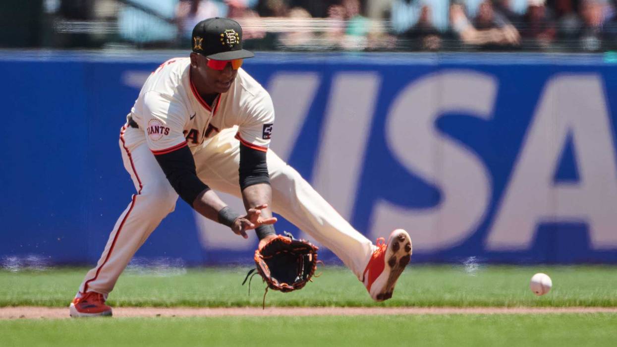 May 19, 2024; San Francisco, California, USA; San Francisco Giants infielder Marco Luciano (37) fields a ground ball against the Colorado Rockies during the first inning at Oracle Park.