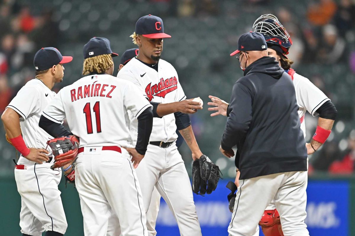 May 7, 2021; Cleveland, Ohio, USA; Cleveland Indians manager Terry Francona relieves relief pitcher Emmanuel Clase (48) during the ninth inning against the Cincinnati Reds at Progressive Field.