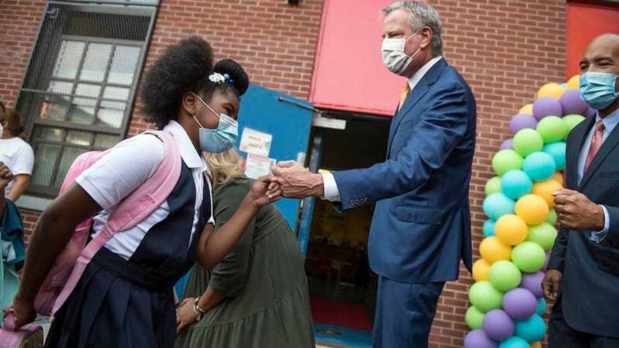 Mayor Bill de Blasio and Schools Chancellor Porter welcome students back for the first day of school at P.S. 25 in the Bronx. Monday, September 13, 2021.
