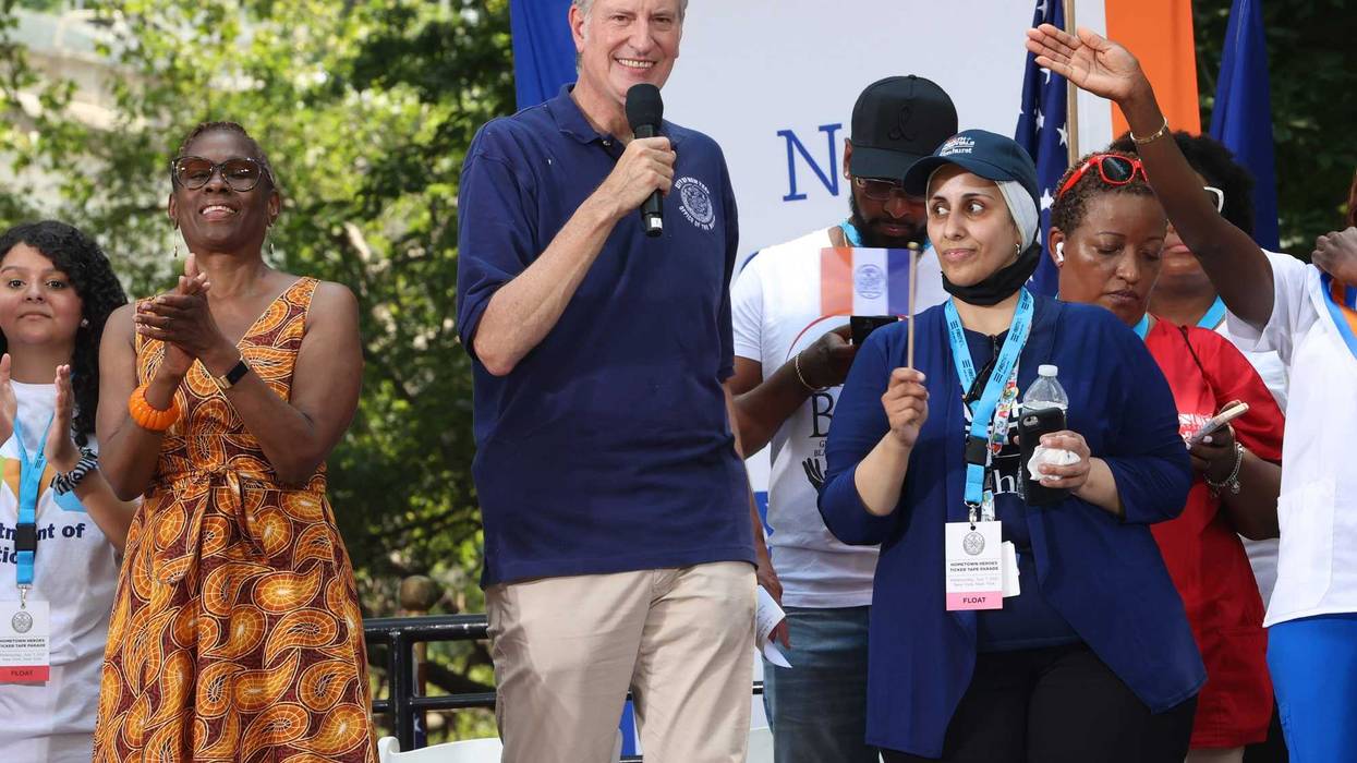 Mayor Bill de Blasio (R) and First Lady Chirlane McCray attend the "Hometown Heroes" Ticker Tape Parade on July 07, 2021 in New York City