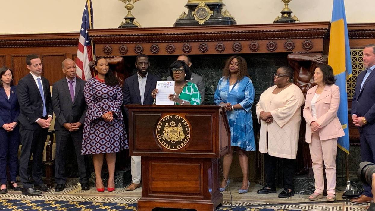 Mayor Cherelle Parker holds a copy of a letter sent to Gov. Josh Shapiro and legislative leaders.