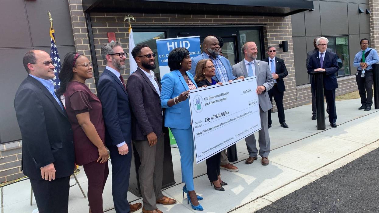Mayor Cherelle Parker poses with the $3.3 million check with Acting Secretary of HUD Adrianne Todman.