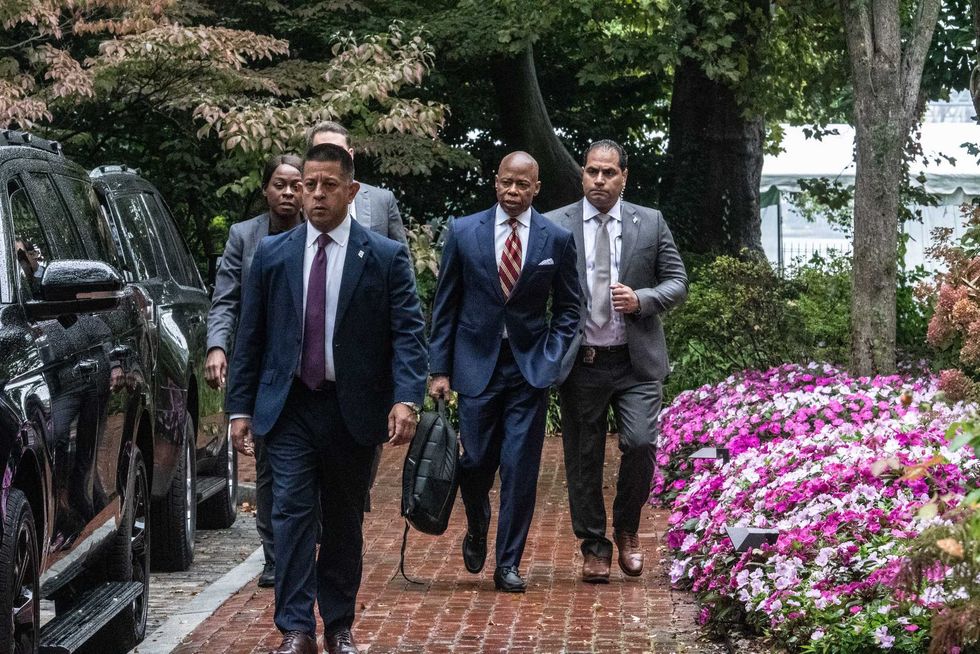 Mayor Eric Adams exits Gracie Mansion on September 26, 2024