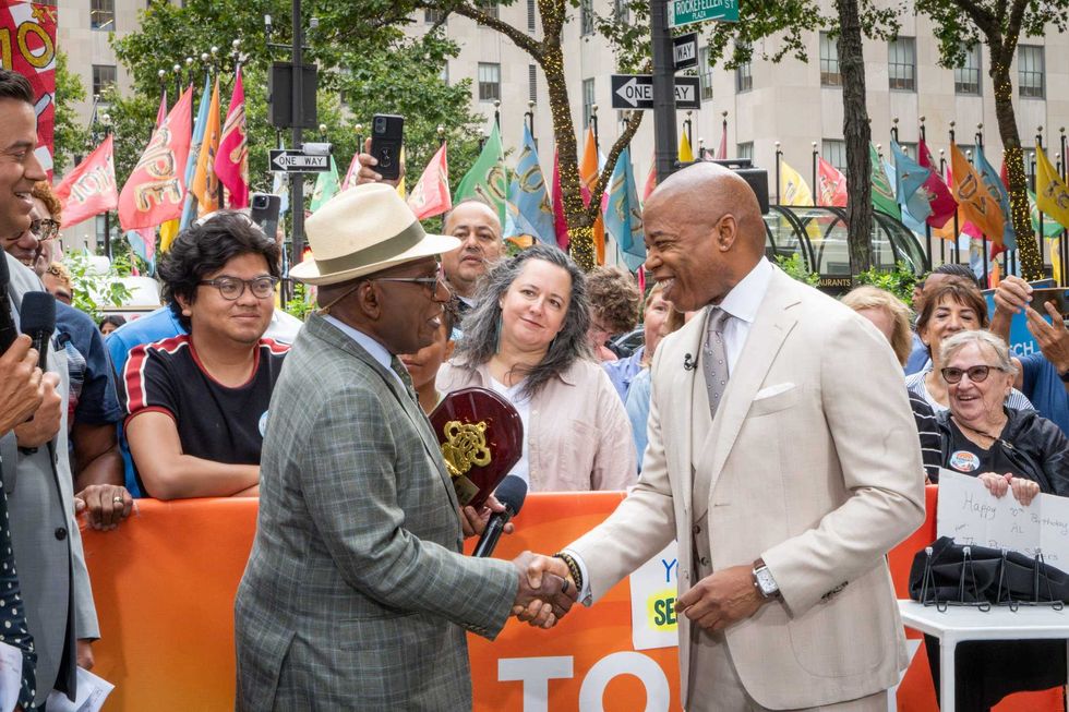 Mayor Eric Adams presents the "Key to the City" to Al Roker