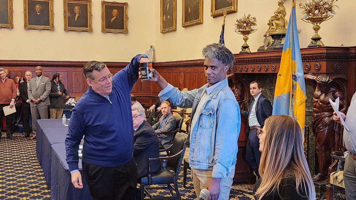Mayoral candidate Jeff Brown draws his number from the storied Horn & Hardart coffee can.