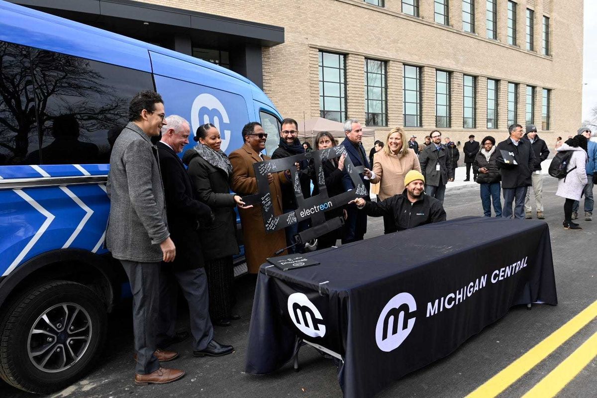 MDOT and partners celebrate the first-in-the-nation electrified public roadway on 14th Street in Detroit.