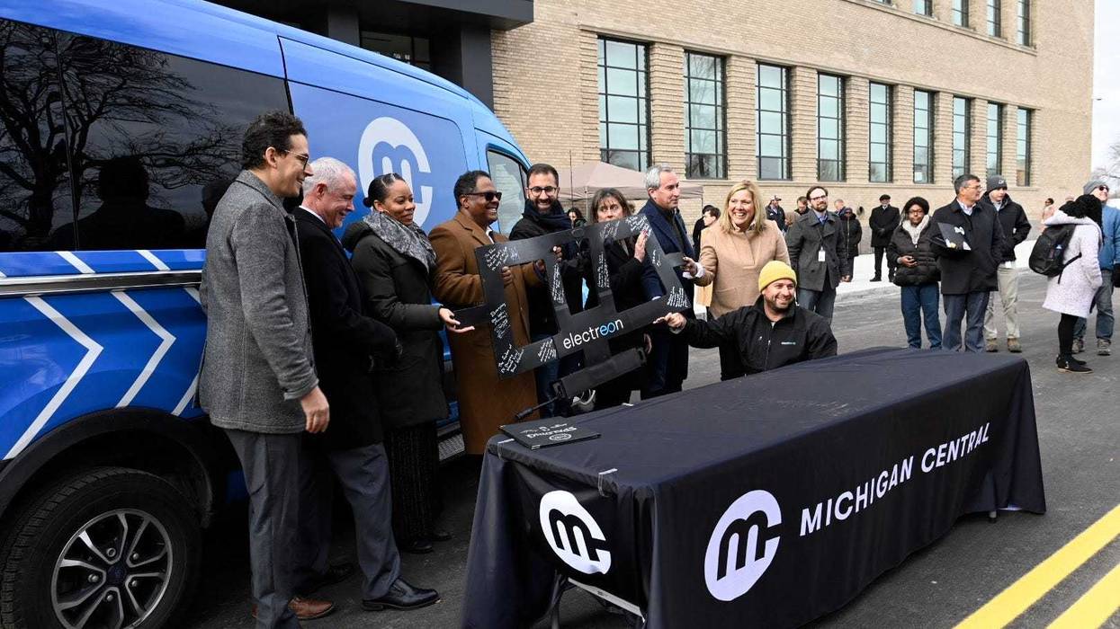 MDOT and partners celebrate the first-in-the-nation electrified public roadway on 14th Street in Detroit.