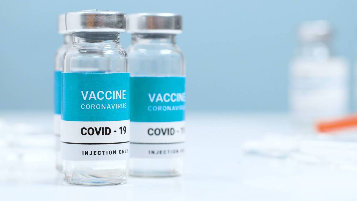 Measles, flu, coronavirus, covid 19 vaccine transparent liquid vials in laboratory. Testing and creating a new vaccine against the epidemic