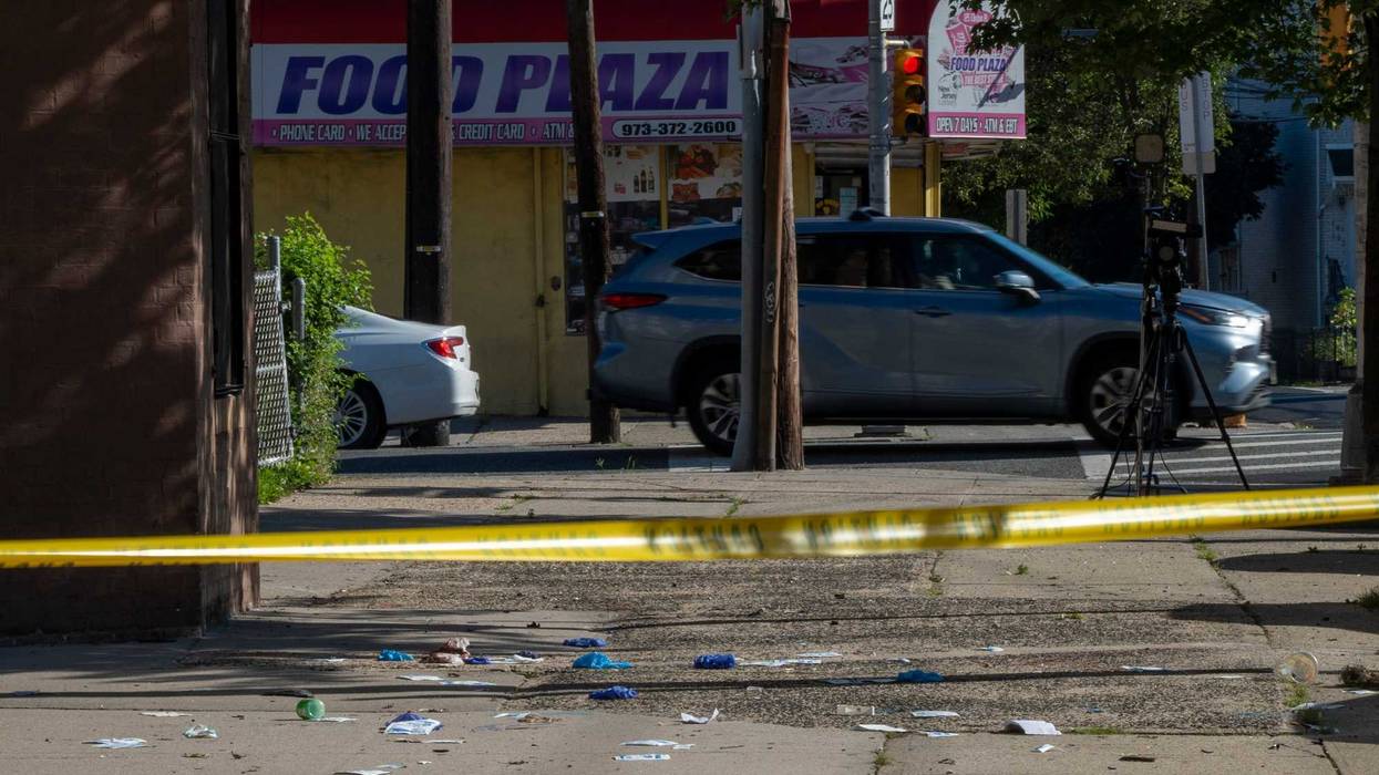 Medical equipment remains on the sidewalk on the morning after a police shooting after a stolen car chase outside of Hawthorne Ave Elementary School in Newark on Tuesday, August 13, 2024