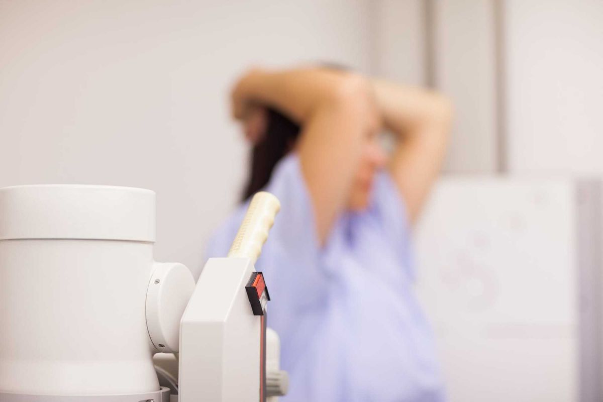 Medical machine next to a patient in an examination room