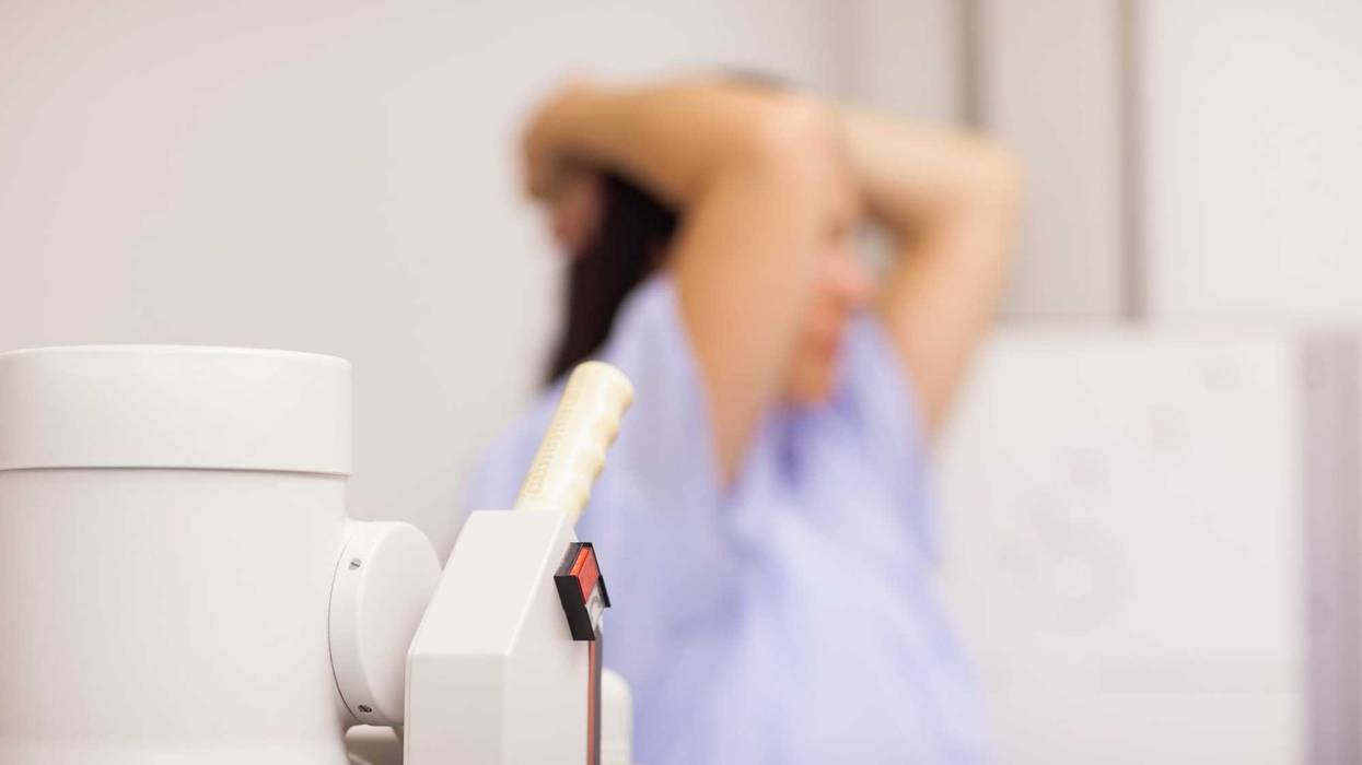 Medical machine next to a patient in an examination room