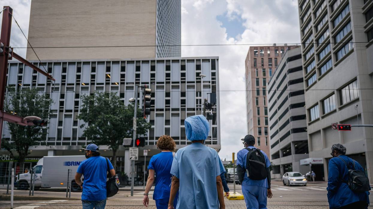 Medical workers outside Houston Methodist Hospital.