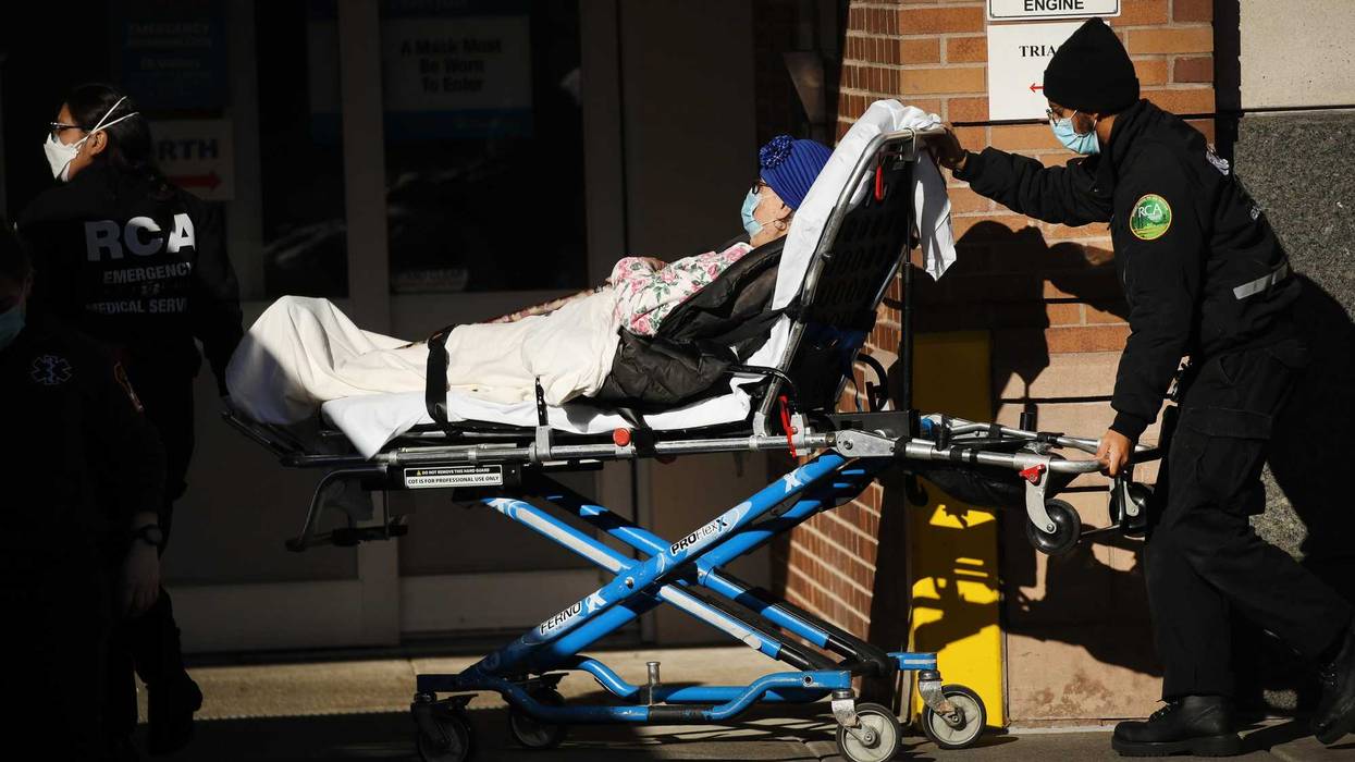 Medical workers tend to a patient at a Brooklyn hospital that has seen a rise in coronavirus-related cases on December 15, 2020 in New York City.