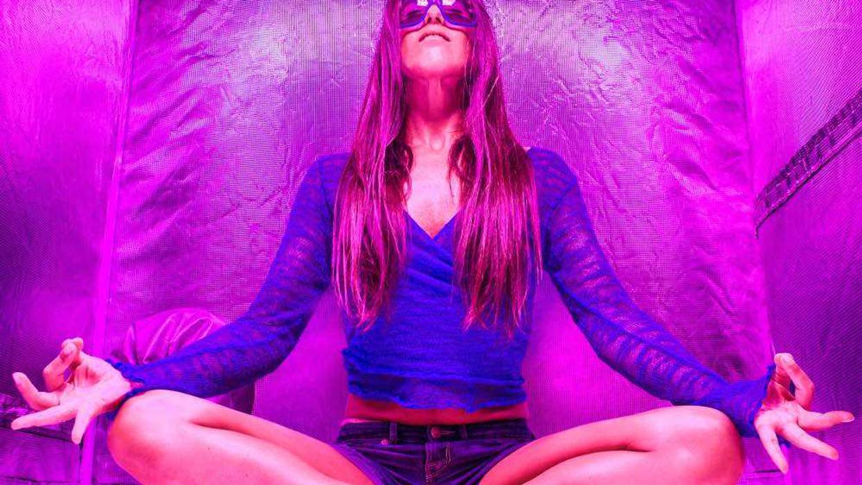 Meditation in purple tent