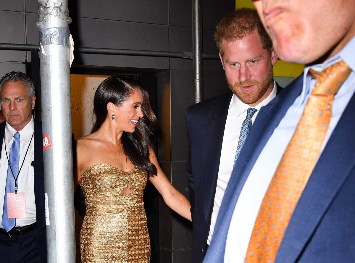 Meghan Markle, Duchess of Sussex, and Prince Harry, Duke of Sussex leave The Ziegfeld Theatre on May 16, 2023 in New York City.