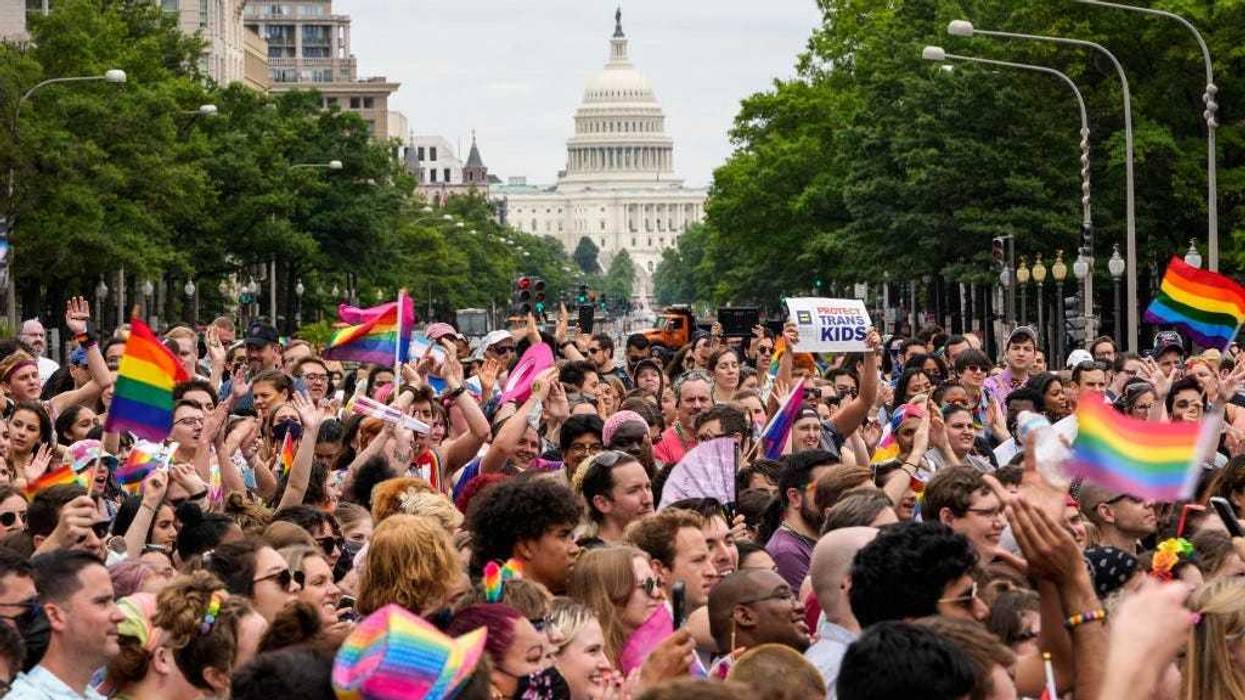 Members and allies of the LGBTQ community participate in the Pride Walk and Rally through downtown Washington, DC on June 12, 2021.