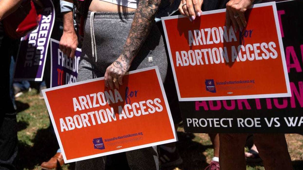 Members of Arizona for Abortion Access, the ballot initiative to enshrine abortion rights in the Arizona State Constitution, hold a press conference and protest condemning Arizona House Republicans and the 1864 abortion ban during a recess from a legislative session at the Arizona House of Representatives on April 17, 2024 in Phoenix, Arizona. Arizona House Republicans blocked the Democrats from holding a vote to overturn the 1864 abortion ban revived last week by the Arizona Supreme Court. (Photo by Rebecca Noble/Getty Images)