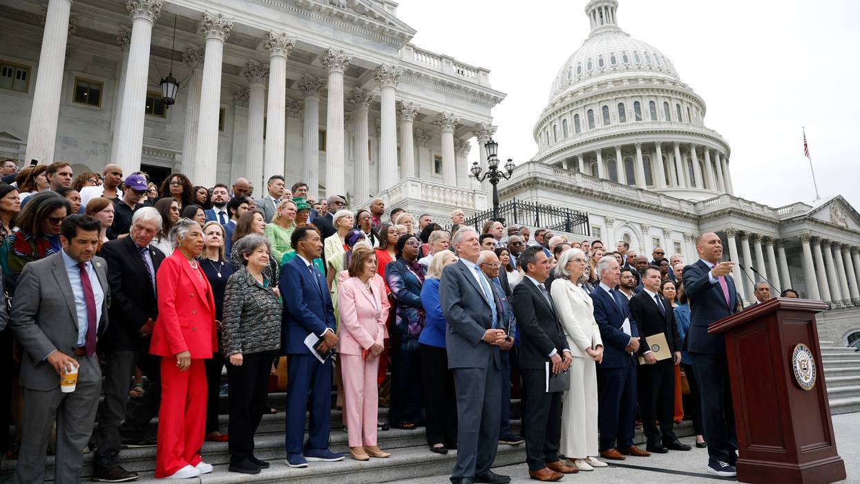 Members of Congress gather on Capitol steps