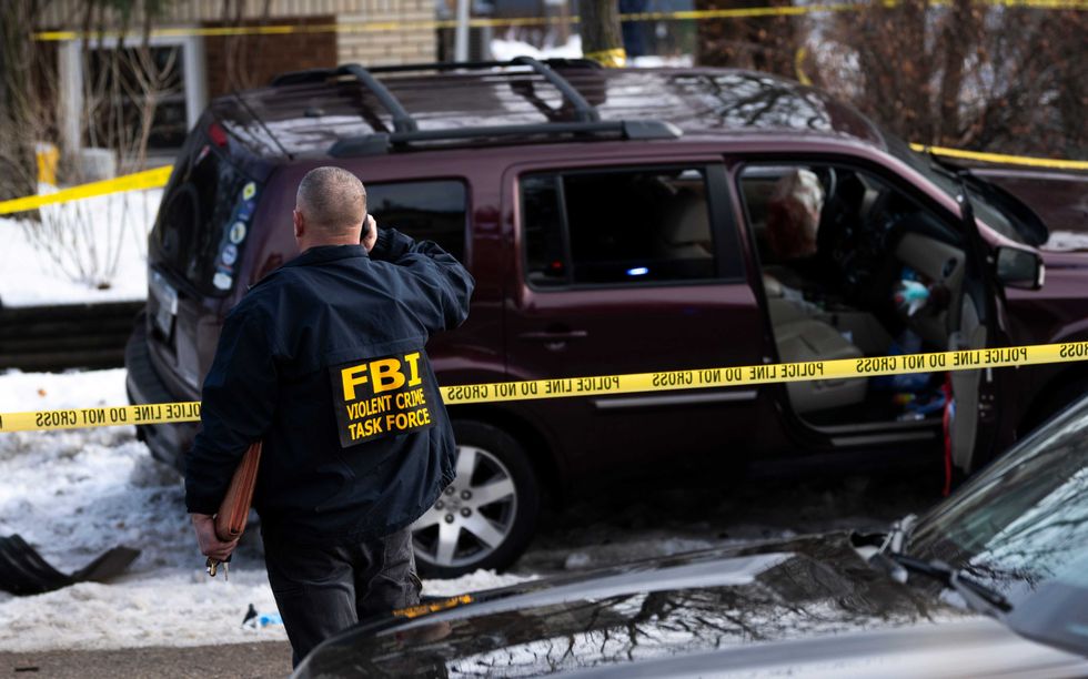 Members of law enforcement work the scene following a suspected shooting by an ICE agent during federal law enforcement operations on January 07, 2026 in Minneapolis, Minnesota. According to federal officials, the agent, "fearing for his life" killed a woman during a confrontation in south Minneapolis.