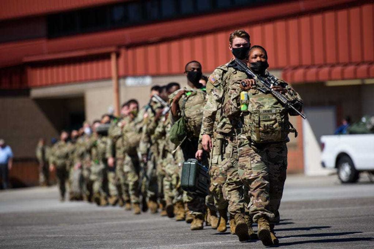 Members of the 1st Armored Brigade Combat Team, 3rd Battalion, 69th Armored Regiment deploy to Germany to reassure NATO allies, deter Russian aggression and to be prepared to support a range of other requirements in the region on March 2, 2022 in Savannah, Georgia. Roughly 7,000 soldiers will be deploying to Germany from the United States with 3,800 from the 3rd Infantry Division. (Photo by Melissa Sue Gerrits/Getty Images)