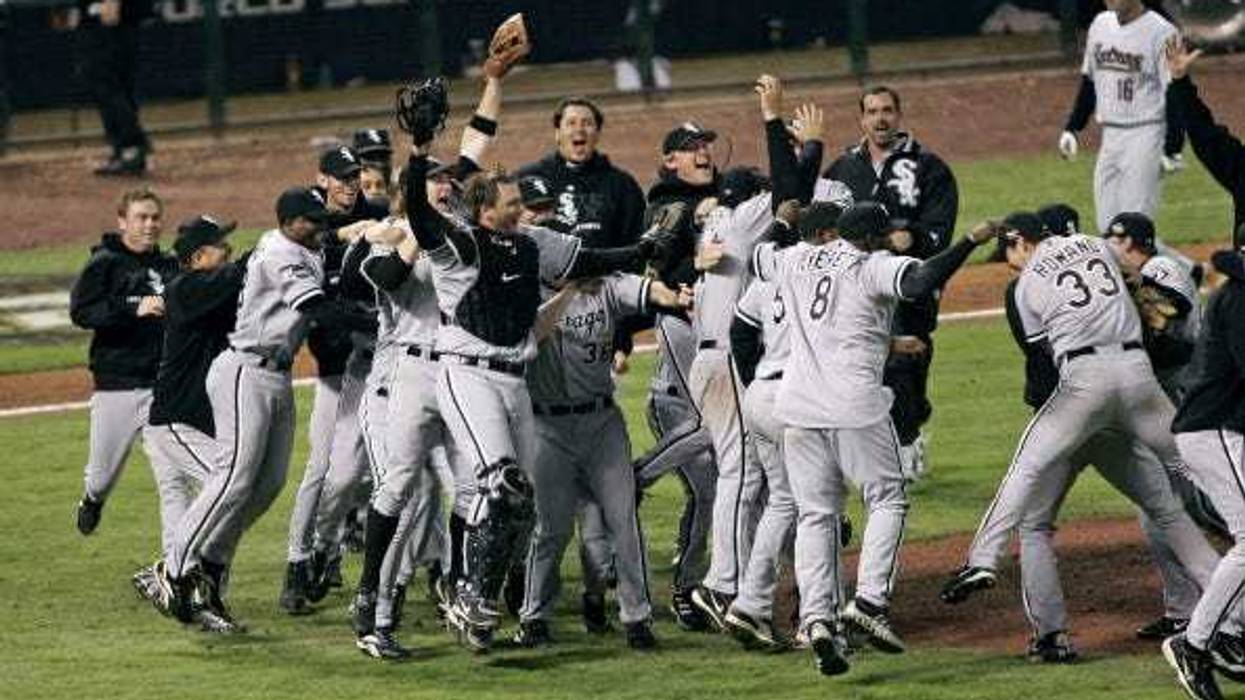 Members of the Chicago White Sox celebrate on the field after winning the 2005 World Series with a 1-0 win over the Houston Astro's at Minute Maid Park in Houston, Texas on October 26, 2005. The White Sox swept the series 4 games to none.
